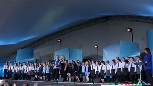 Iolo Morganwg pupils performing at Eisteddfod with H and Carryl Parry Jones